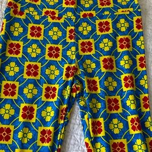LuLaRoe Leggings Brand New. Bright blue, yellow and red. One Size